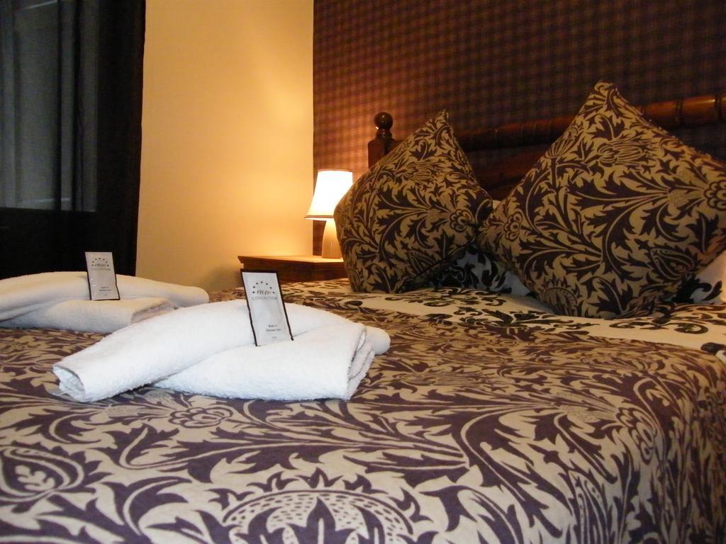 Royal Mile Group Apartments Единбург Стая снимка